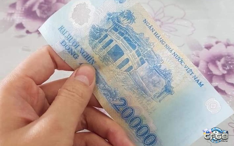 mơ nhặt được tiền 20 nghìn đánh con gì